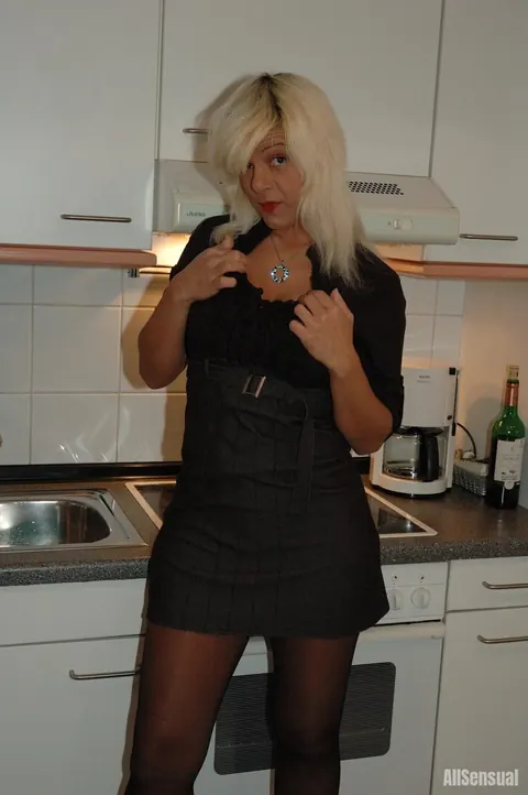 Blonde MILF Strips to Pantyhose and Heels in the Kitchen – photo 2 of 12
