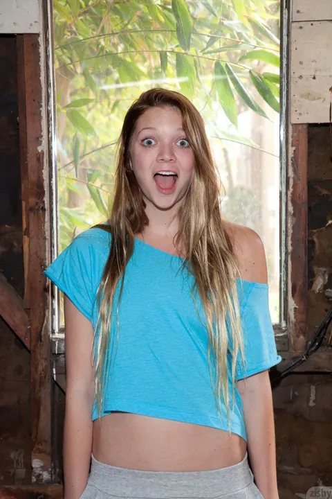 Jessie Andrews: Petite Blonde Poses in Shorts and Panties in the Forest – photo 2 of 11