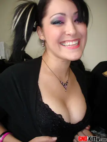 Asian Brunette in Pigtails and Lingerie Strips and Spreads