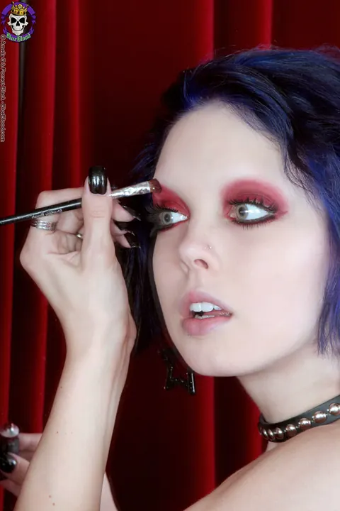 Woman Applies Makeup Topless in Panties Before a Mirror – photo 7 of 15
