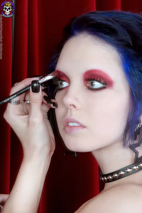 Woman Applies Makeup Topless in Panties Before a Mirror – photo 12 of 15