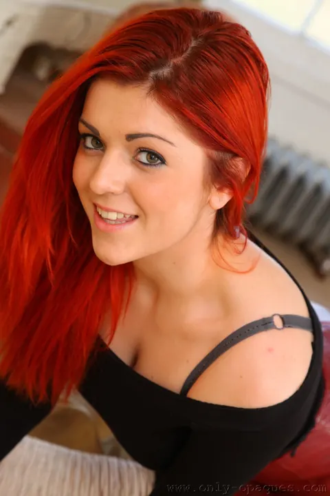 Rosie Rees: British Redhead Flaunts Her Curves in a Latex Skirt and Stockings – photo 3 of 21