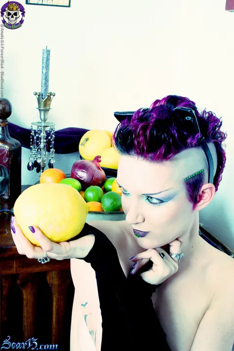 Scar 13: Tattooed Short-Haired Brunette Bites Citrus Fruit Nude – photo 6 of 15