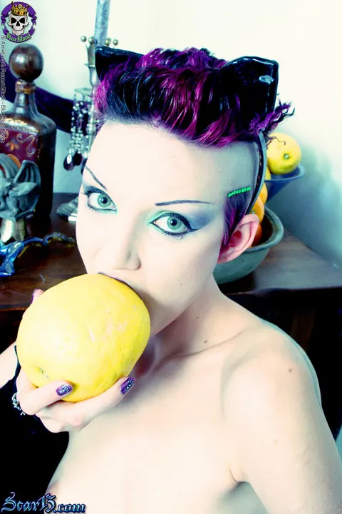 Scar 13: Tattooed Short-Haired Brunette Bites Citrus Fruit Nude – photo 11 of 15