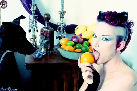 Scar 13: Tattooed Short-Haired Brunette Bites Citrus Fruit Nude – photo 3 of 15