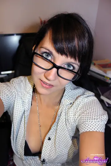 Slim Brunette in Lingerie and Glasses Masturbates with a Dildo