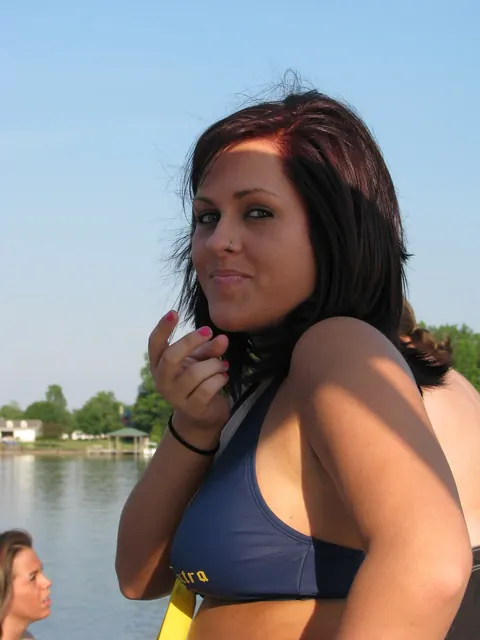 Busty Curvy Woman in a Bikini and Glasses Flaunts Her Body on a Boat – photo 15 of 20