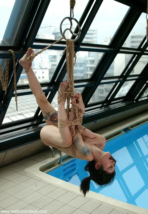 MILF in Bondage Poses Nude by the Pool – photo 13 of 21