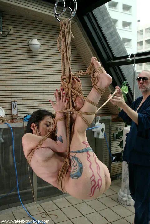 MILF in Bondage Poses Nude by the Pool – photo 20 of 21