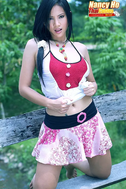 Nancy Ho: Asian MILF Bares All and Spreads on a Garden Bench – photo 1 of 16