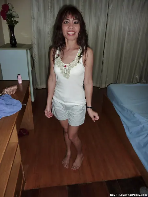 Kaay: Slim Asian Brunette Strips Nude and Spreads Her Legs – photo 1 of 13