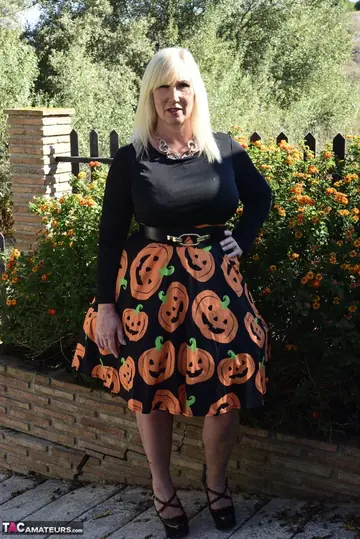 Mature Blonde PAWG Lifts Her Halloween Skirt Outdoors to Show Lingerie