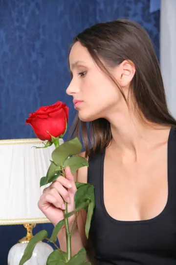 Asian Brunette Undresses and Opens Her Shaved Pussy