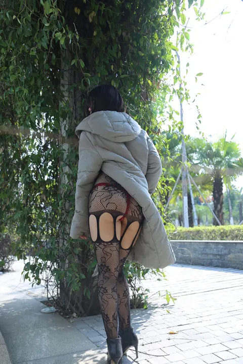 Thick Asian Brunette Flaunts Her Legs in Stockings Outdoors – photo 14 of 21