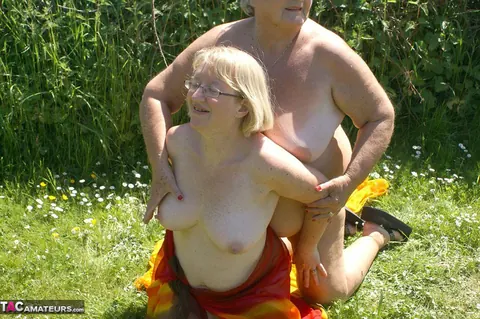 Busty Brunette in Glasses Kisses and Oils Up Outdoors – photo 9 of 20