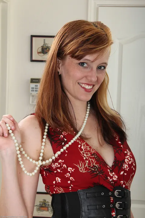 Tall Redhead MILF Strips and Fingers Her Hairy Pussy – photo 1 of 21