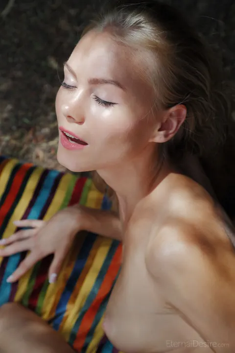 Nancy A: Blonde with Natural Tits Spreads on Throw Cushions Outdoors – photo 14 of 16