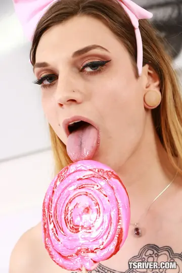 Slim Tattooed Trans Woman Takes Cum in Mouth