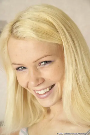 Blonde with Small Natural Tits Strips Off Her Top and Bottoms