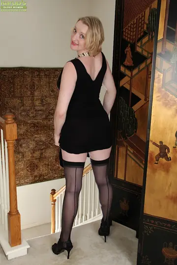 European MILF Strips Out of Her Stockings and Heels to Reveal Her Pussy