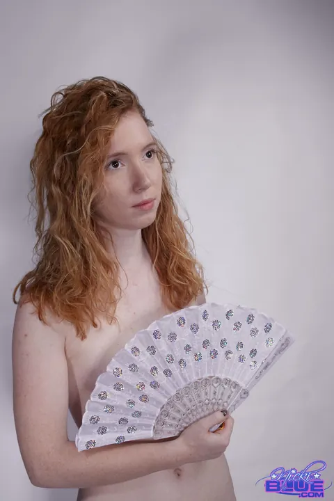 Nicki Blue: Redhead with Big Enhanced Tits Poses Nude for a Modeling Shoot – photo 13 of 15
