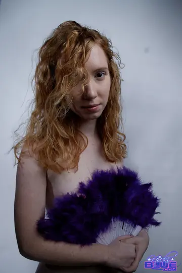 Nicki Blue – Redhead with Big Enhanced Tits Poses Nude for a Modeling Shoot
