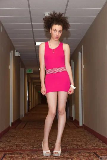 Tall Short-Haired Woman Strips Out of Her Pink Dress