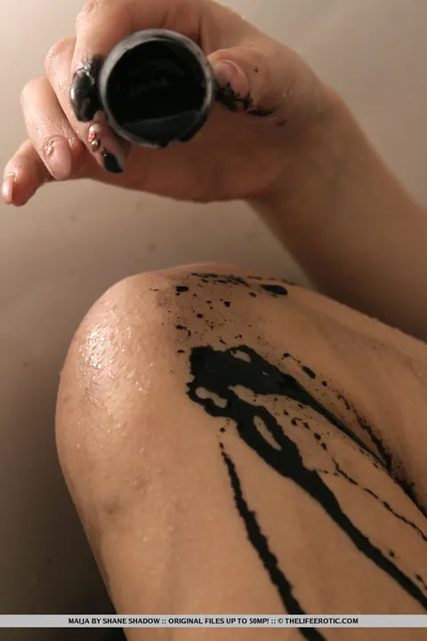 Woman Masturbates in the Bath Wearing Lingerie – photo 10 of 16