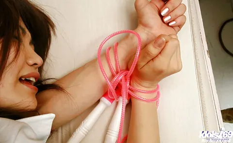 Mie Matsuoka: Athletic Japanese Brunette Fingers Her Hairy Pussy While Bound in the Gym – photo 16 of 16