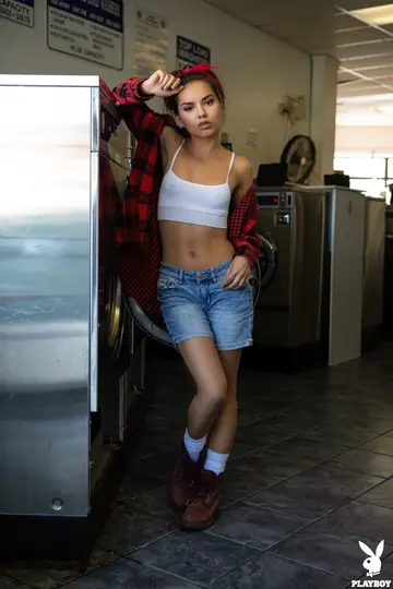 Dominique Gabrielle – Slim Short-Haired Babe Strips Outdoors in Shorts