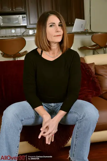 Carissa Dumonde – Redhead MILF in Jeans Strips and Spreads Wide