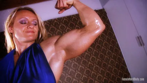 Brigita Brezovac: European MILF Oils Her Muscular Arms in a Skirt – photo 10 of 21