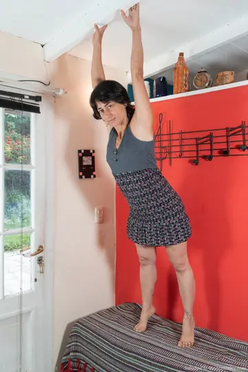 Brunette Latina MILF Drops Her Dress and Fingers Her Hairy Pussy