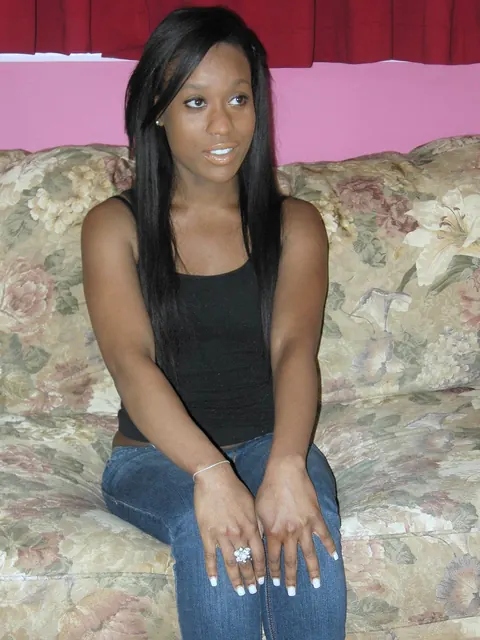 Petite Ebony Beauty Poses Fully Clothed Outdoors – photo 2 of 20