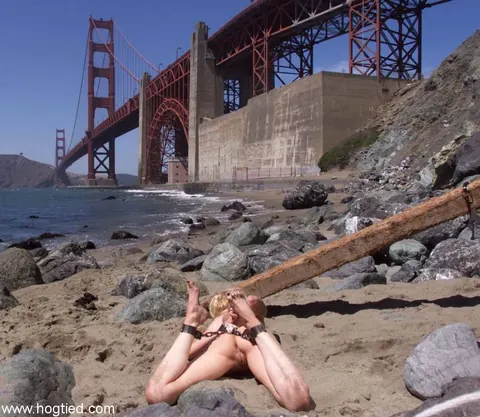 Sadie Belle: Blonde with Big Tits Spreads in Metal Bondage on the Beach – photo 7 of 17