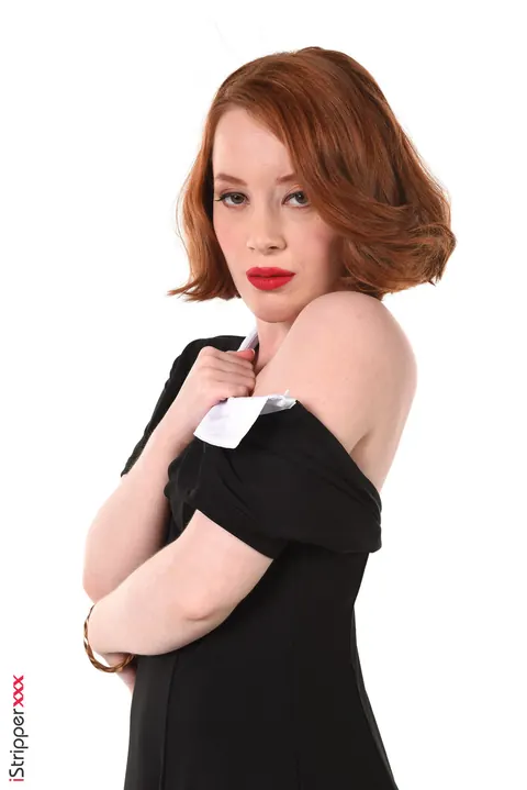 Lottie Magne: Short-Haired Redhead in Uniform Licks a Dildo and Shows Her Hairy Pussy – photo 6 of 15
