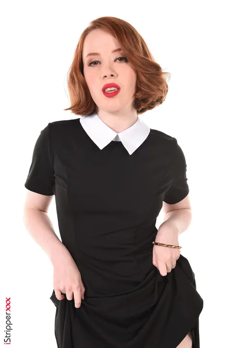 Lottie Magne: Short-Haired Redhead in Uniform Licks a Dildo and Shows Her Hairy Pussy – photo 4 of 15