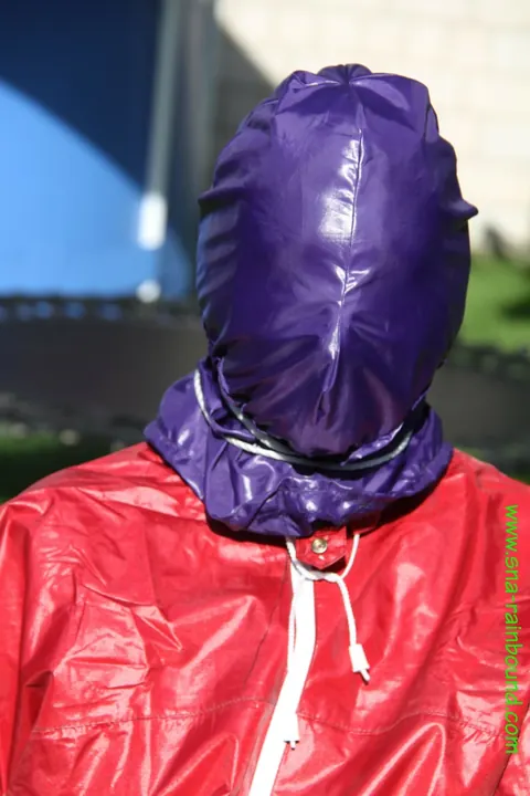 Amateur in Latex Bound to a Chair Outdoors – photo 12 of 16