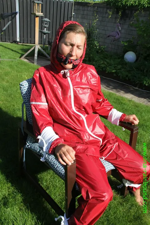 Amateur in Latex Bound to a Chair Outdoors – photo 10 of 16