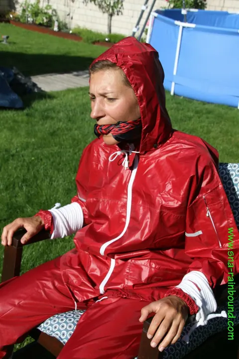 Amateur in Latex Bound to a Chair Outdoors – photo 8 of 16