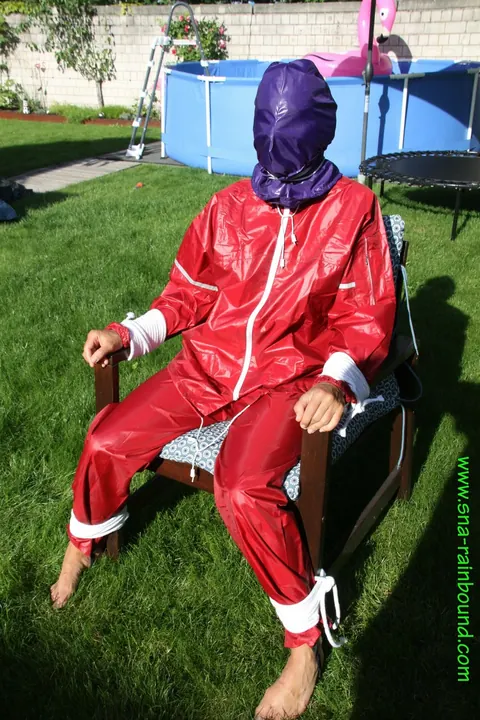 Amateur in Latex Bound to a Chair Outdoors – photo 14 of 16