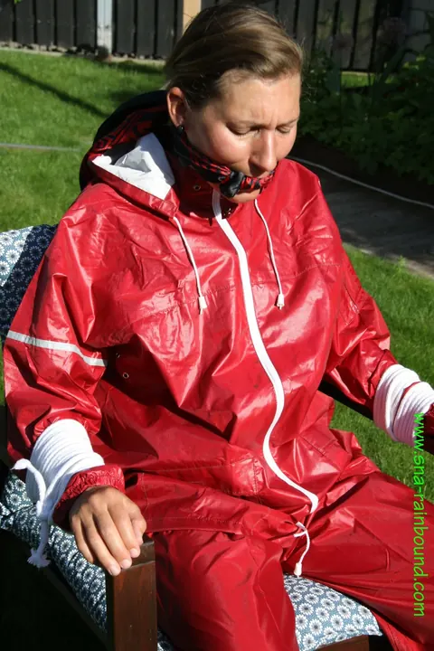 Amateur in Latex Bound to a Chair Outdoors – photo 3 of 16