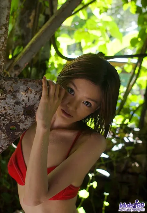 Slim Japanese Redhead Reveals Her Tits and Ass in the Jungle – photo 9 of 16