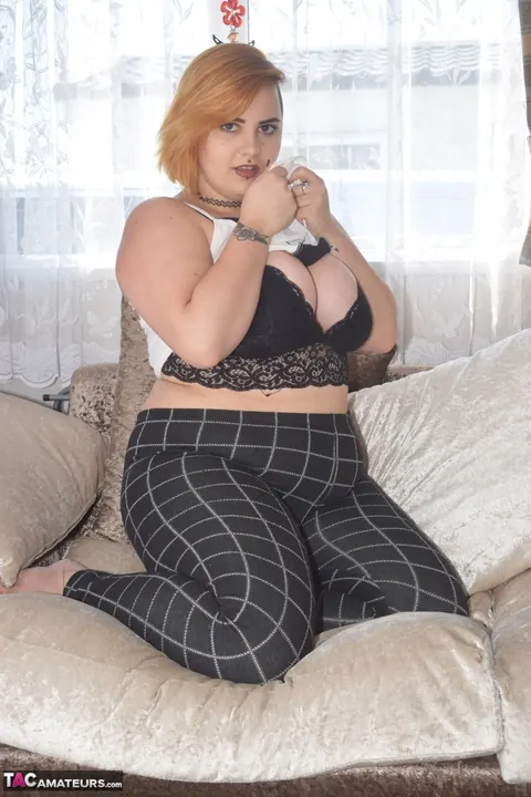 Chubby Redhead MILF Strips Out of Her Lingerie on the Sofa – photo 7 of 20