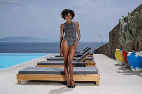 Luna Corazon: Busty Ebony Brunette Strips Out of Her Bodysuit Outdoors – photo 1 of 20