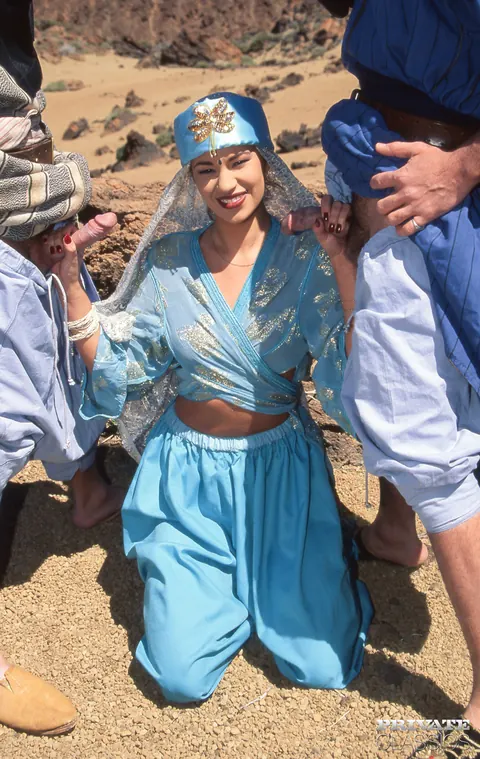 Julia Spain: Hairy MILF in Costume Takes Double Penetration in the Desert – photo 4 of 12