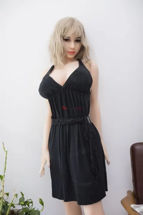 Blonde Strips Out of Her Black Dress and Flaunts Her Huge Tits – photo 7 of 11