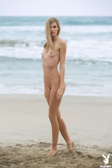 Tall Italian Blonde Strips Naked and Poses on the Beach