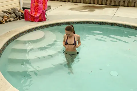 Aubrey Star: Slim Blonde Strips Off Her Bikini and Spreads at the Pool – photo 3 of 20
