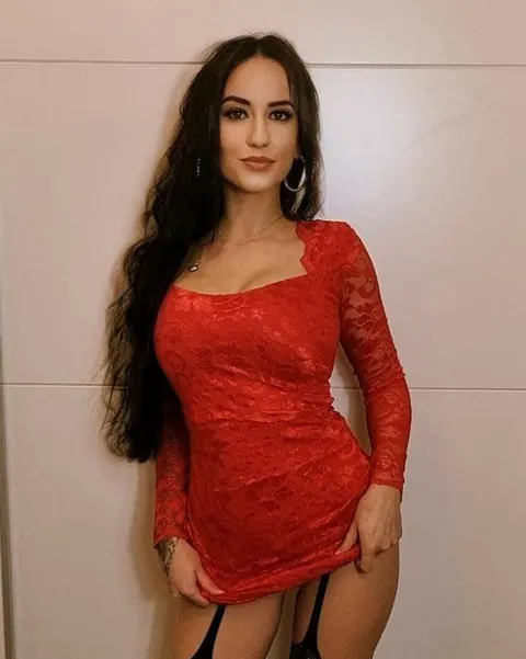 Brunette Peels Off Her Red Lingerie and Poses Nude – photo 11 of 18